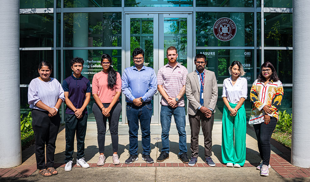 From left to right, those participating in the MSU/USDA Graduate Summer Research Experience program include Bini Dahal, North Carolina State University; Lyem Ningthou, University of California, Berkeley; Ramyasri Veerapaneni, Ahmed Alam, Ian Sartorio, Hafez Ahmad, all of MSU; Nargis Mirzaie, University of Massachusetts Amherst; and Tamanna Rashme, MSU. Photo by David Ammon